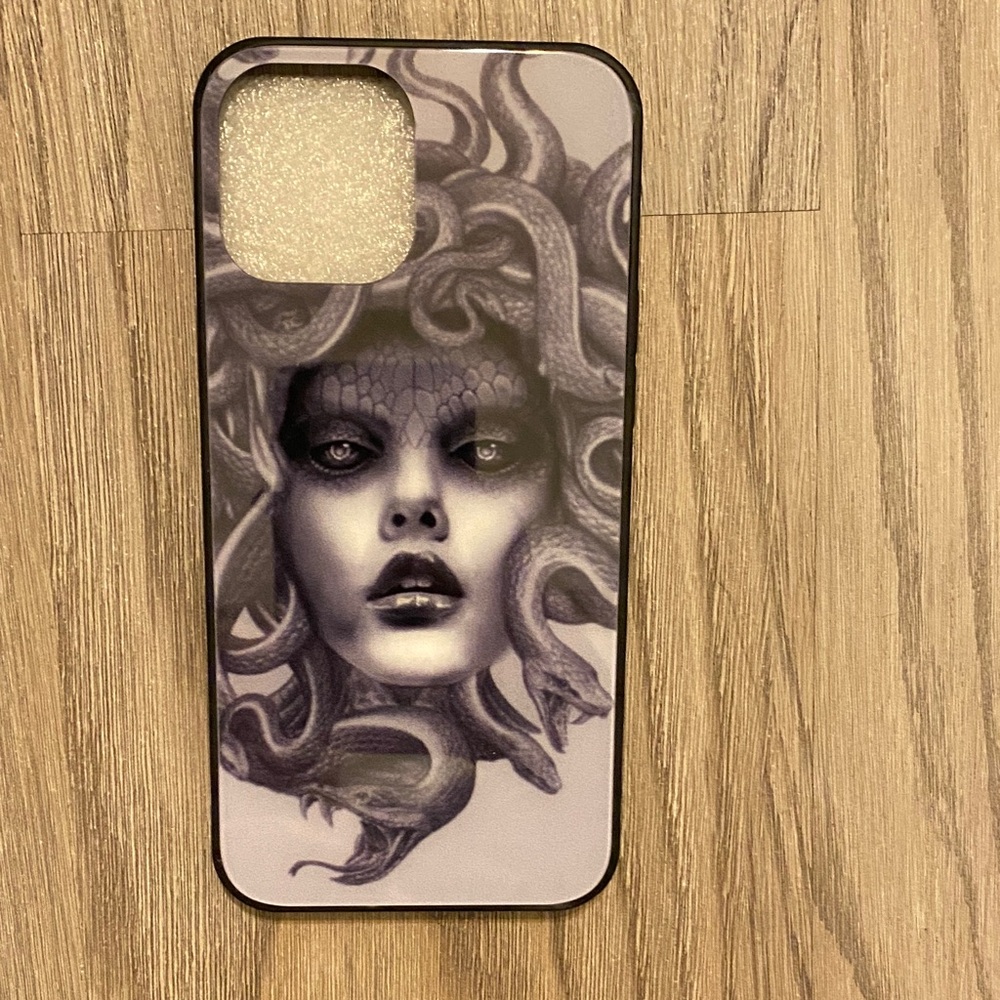 Stylish Black Phone Case with Medusa Design